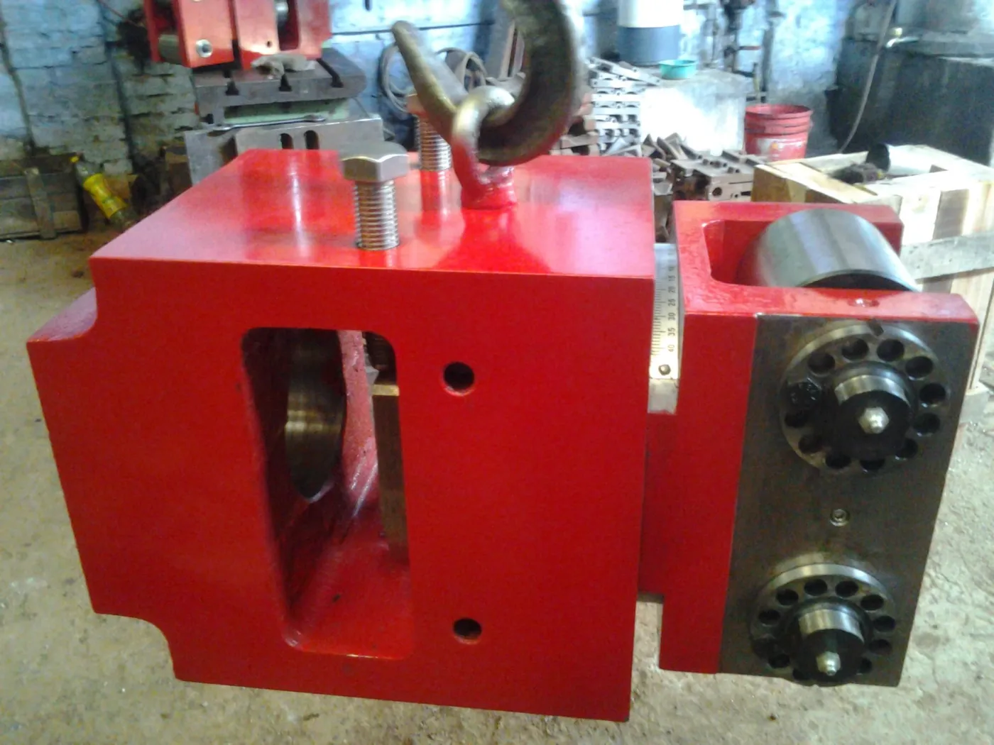 Machined guide box housing showing bore and mounting face