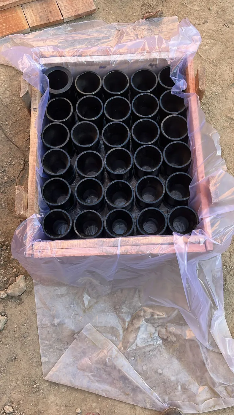 Guide sleeves packed in a timber crate