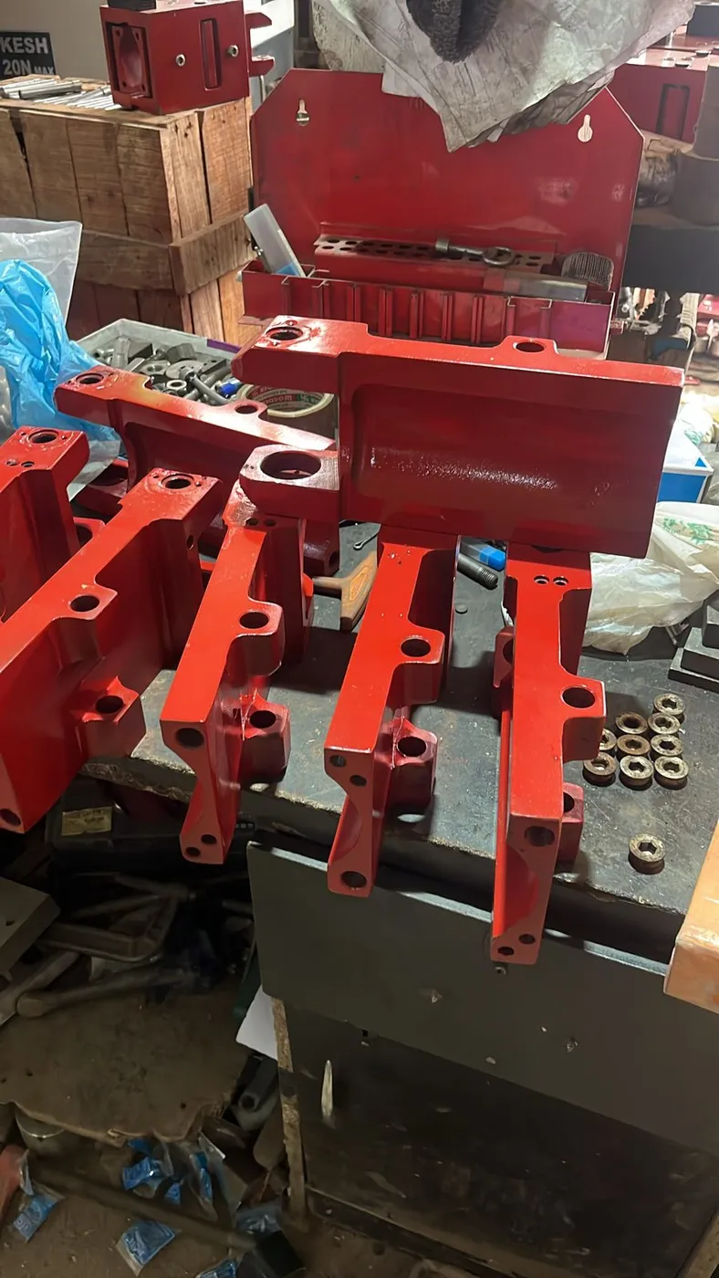 Painted guide arms and lever assemblies